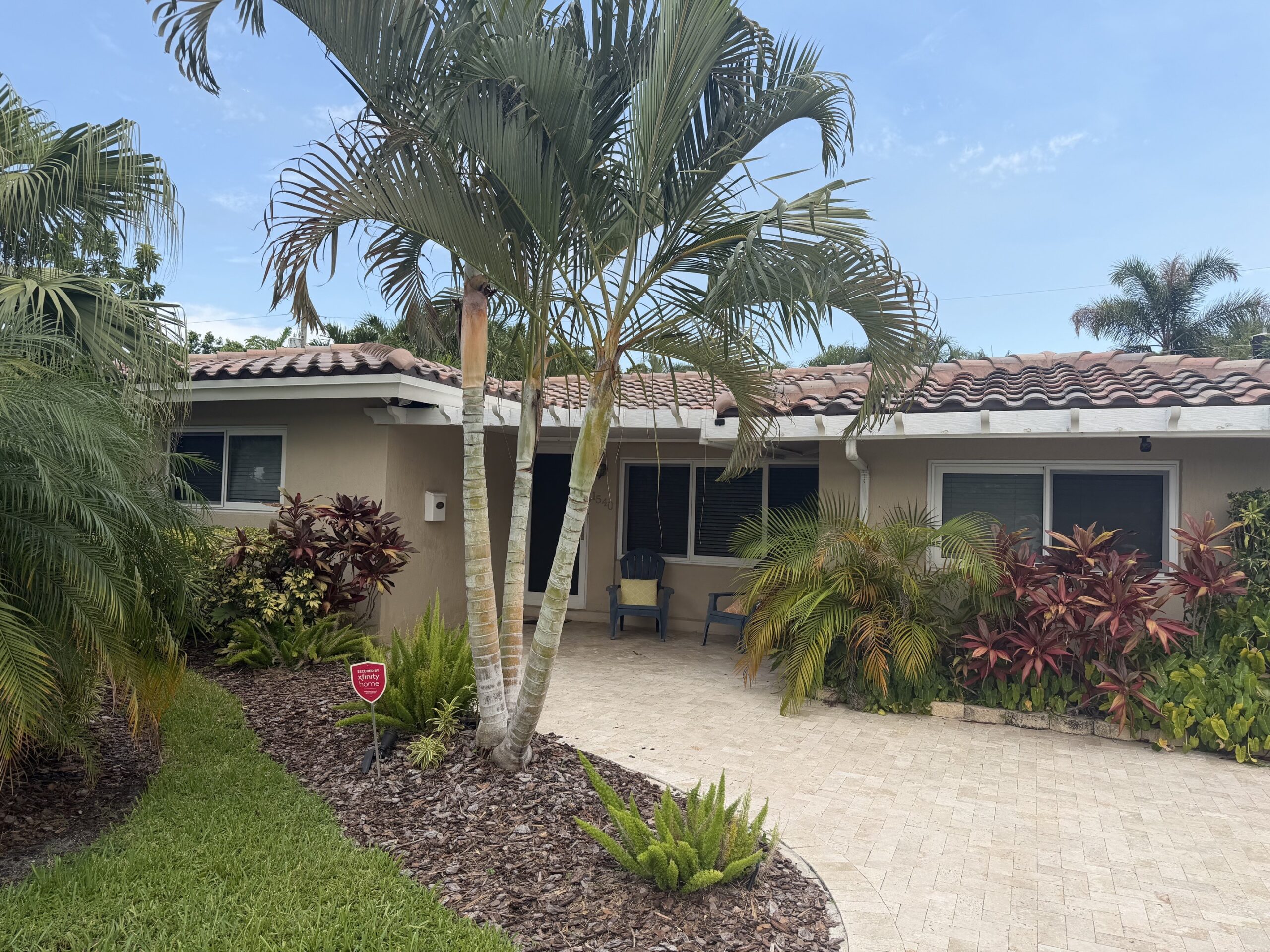 Front exterior of Wilton Manors, FL home with new tile roof