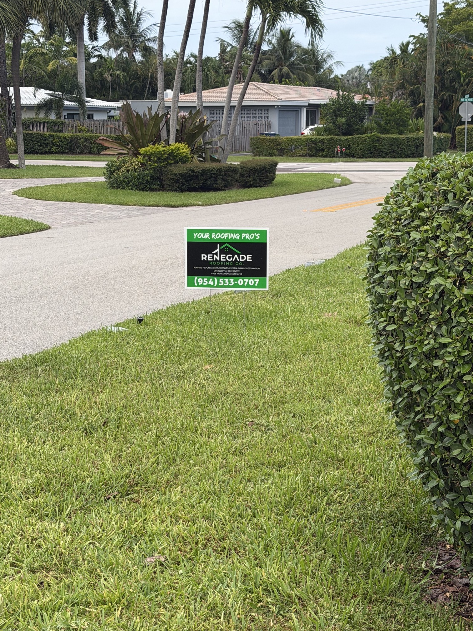 Renegade Roofing Co. yard sign at completed Wilton Manors, FL job